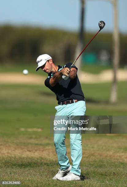 Wade Ormsby of Australia hits his second shot on the 17th hole during day three of the 2017 Fiji International at Natadola Bay Championship Golf...