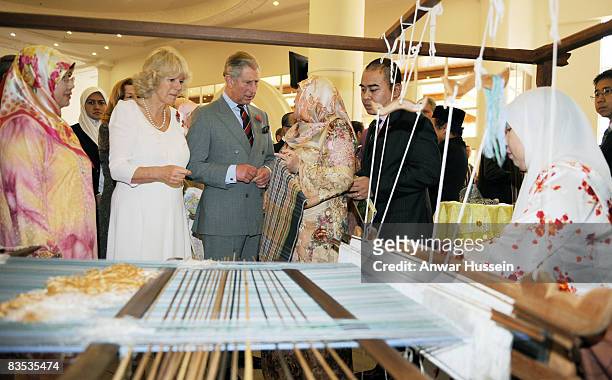Prince Charles, Prince of Wales and Camilla, Duchess of Cornwall tour a craft fair at the University on November 1, 2008 in Brunei Darussalam. The...