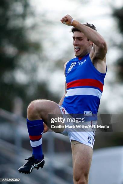 Tom Campbell of Footscray Bulldogs celebrates a goal during the round 18 VFL match between the Essendon Bombers and Footscray Bulldogs at Windy Hill...