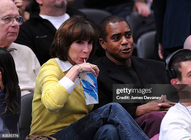 Ahmad Rashad and his wife Sale Johnson attend the Milwaukee Bucks vs New York Knicks game at Madison Square Garden on November 2, 2008 in New York...