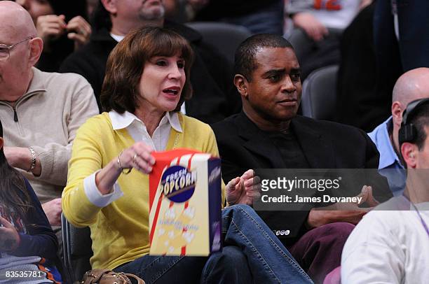 Ahmad Rashad and his wife Sale Johnson attend the Milwaukee Bucks vs New York Knicks game at Madison Square Garden on November 2, 2008 in New York...