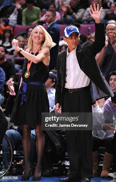 Marathon winners Paula Radcliffe and Marilson Gomes dos Santos attend the Milwaukee Bucks vs New York Knicks game at Madison Square Garden on...