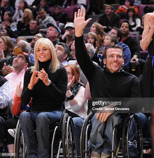 Marathon winners Edith Hunkeler and Kurt Fearnley attend the Milwaukee Bucks vs New York Knicks game at Madison Square Garden on November 2, 2008 in...