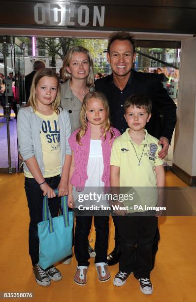 Jason Donovan and Angela Malloch with his two children Zach and Jemma arriving at the UK Film Premiere of 'Hannah Montana' at the Odeon West End,...
