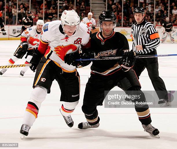 Dion Phaneuf of the Calgary Flames fights for postion against Rob Niedermayer of the Anaheim Ducks during the game on November 2, 2008 at Honda...