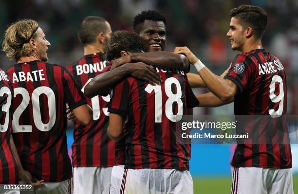 Riccardo Montolivo of AC Milan celebrates his second goal with his team-mate Franck Kessie during the UEFA Europa League Qualifying Play-Offs round...