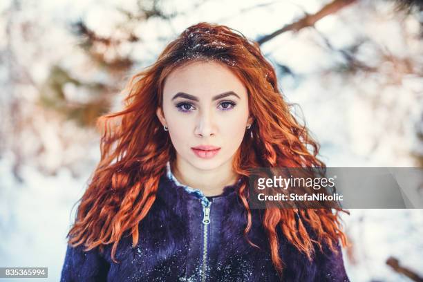 portraite of redhead girl on winter - giving a girl head stock pictures, royalty-free photos & images