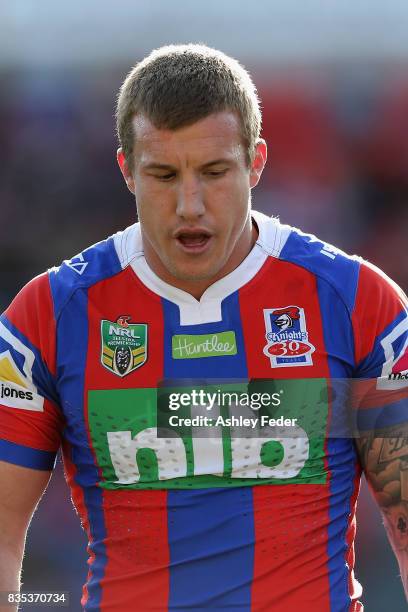 Trent Hodkinson of the Knights looks dejected during the round 24 NRL match between the Newcastle Knights and the Melbourne Storm at McDonald Jones...