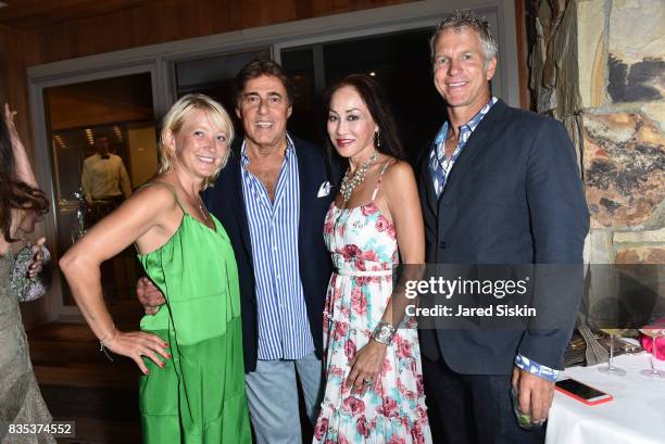 Janna Bullock, Arnie Rosenshein, Lucia Hwong Gordon and Christopher Clark attend ARTrageous Gala + Art Auction benefitting Hour Children at a Private...