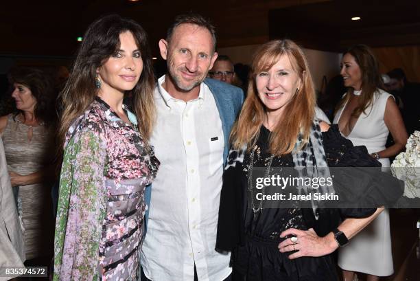 Olya Kislin, Arik Kislin and Designer Nicole Miller attend ARTrageous Gala + Art Auction benefitting Hour Children at a Private Residence on August...