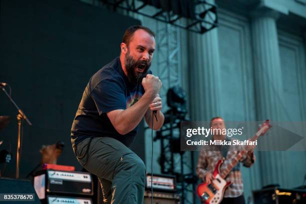 Vocalist Neil Fallon and bassist Dan Maines of Clutch perform at The Greek Theater on August 18, 2017 in Berkeley, California.