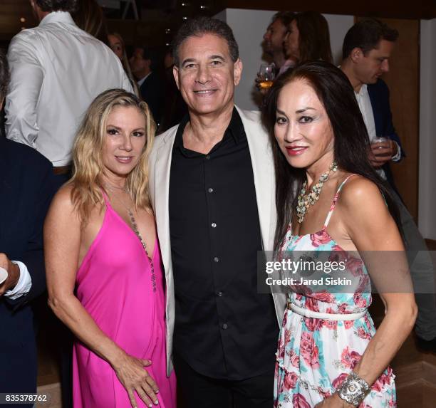 Ramona Singer, Steven Gerber and Lucia Hwong Gordon attend ARTrageous Gala + Art Auction benefitting Hour Children at a Private Residence on August...