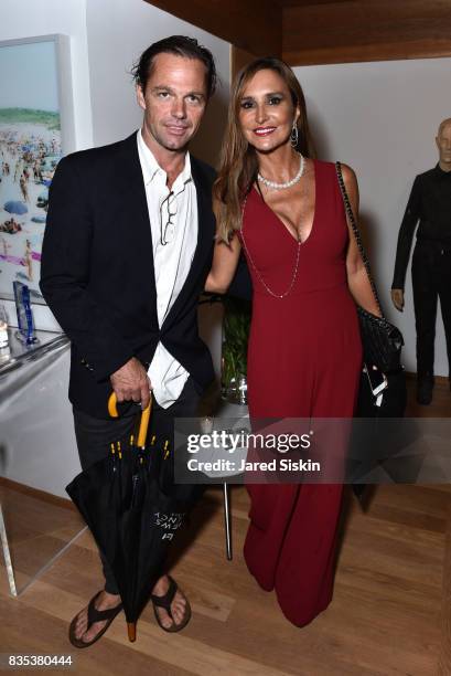 Justin Ward and Carole Crist attend ARTrageous Gala + Art Auction benefitting Hour Children at a Private Residence on August 18, 2017 in Southampton,...