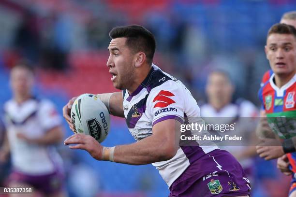 Nelson Asofa-Solomona of the Storm in action during the round 24 NRL match between the Newcastle Knights and the Melbourne Storm at McDonald Jones...