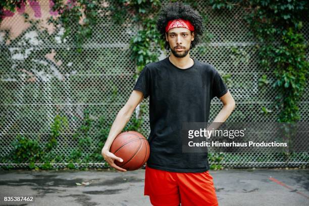 portrait of stylish urban basketball player - headband stock pictures, royalty-free photos & images