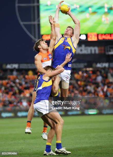 Nathan Vardy of the Eagles takes a mark over Matt de Boer of the Giants during the round 22 AFL match between the Greater Western Sydney Giants and...