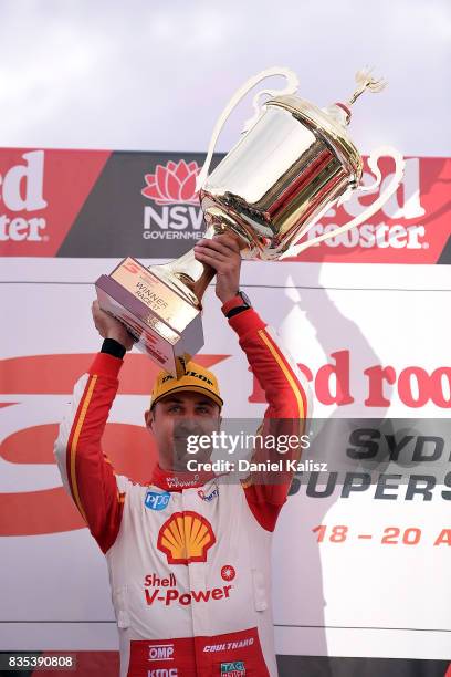 Fabian Coulthard drives the Shell V-Power Racing Team Ford Falcon FGX celebrates after winning race 17 for the Sydney SuperSprint, which is part of...