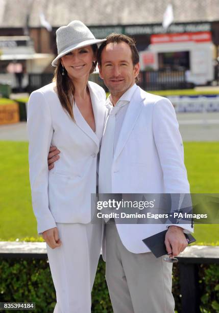 Designer Synan O'Mahony and Amanda Kelvin the Punchestown Racing Festival at Punchestown Racecourse, Ireland.