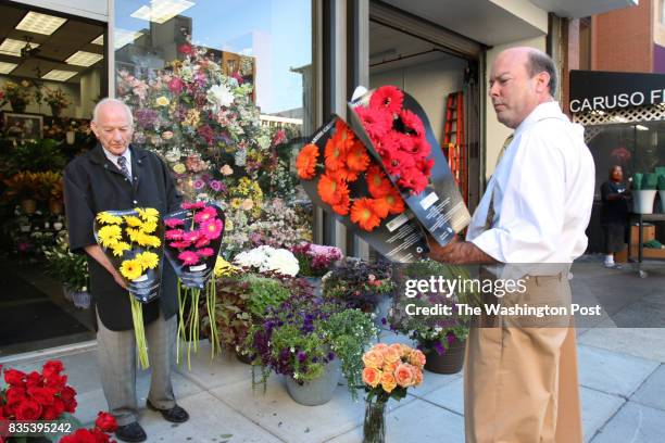 Washington, DC Phil Caruso and his son Michael Caruso, left and right, continue the family business, Caruso Florist, that was started in Washington,...