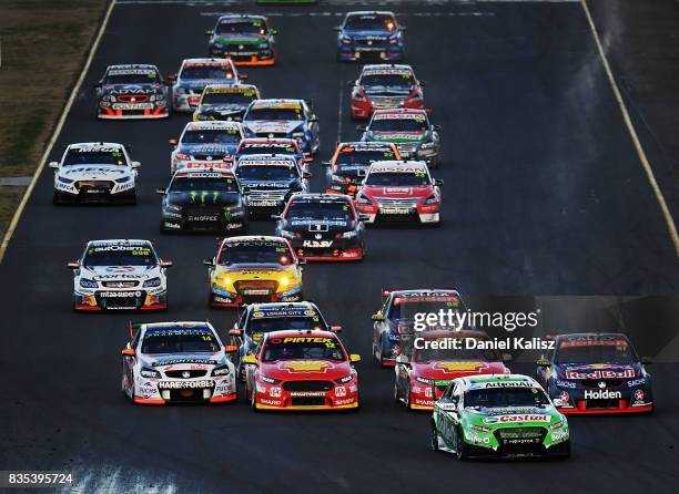 Mark Winterbottom drives the The Bottle-O Racing Ford Falcon FGX leads at the start of race 17 for the Sydney SuperSprint, which is part of the...