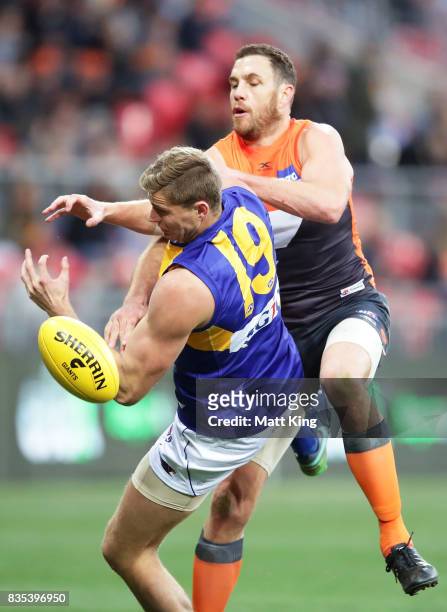Nathan Vardy of the Eagles is challenged by Shane Mumford of the Giants during the round 22 AFL match between the Greater Western Sydney Giants and...
