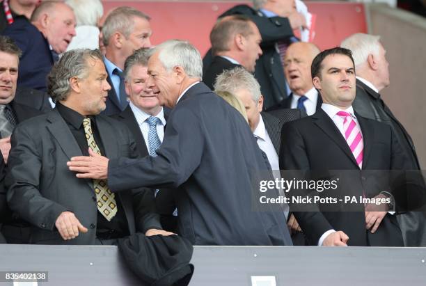 West Ham United Technical Director Gianluca Nani talks to former chairman Terence Brown as Chief Executive Scott Duxbury stands right