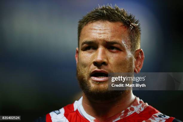 Jared Waerea-Hargreaves of the Roosters is attended to by a trainer during the round 24 NRL match between the Sydney Roosters and the Wests Tigers at...