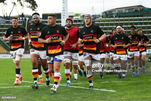 Dwayne Sweeney of Waikato leads his team off the field after warming up during the round one Mitre 10 Cup match between Taranaki and Waikato at...