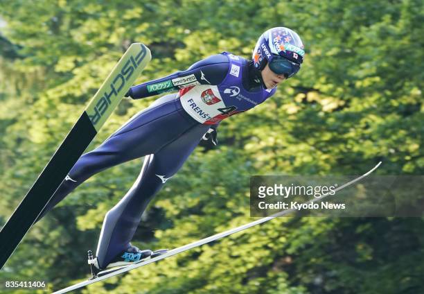 Yuki Ito soars through the air in Frenstat, the Czech Republic, on Aug. 18 in the second event of the women's ski jumping summer Grand Prix...