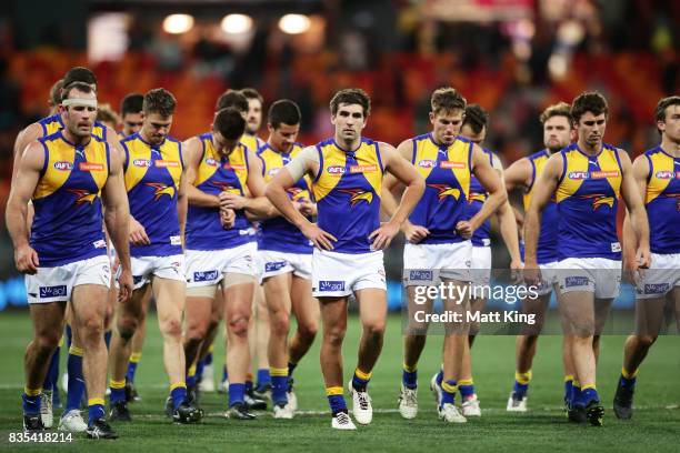 Eagles players look dejected after the round 22 AFL match between the Greater Western Sydney Giants and the West Coast Eagles at Spotless Stadium on...
