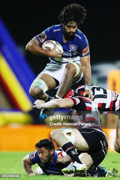 Akira Ioane of Auckland leaps over players during the round one Mitre 10 Cup match between Counties Manukau and Auckland at ECOLight Stadium on...