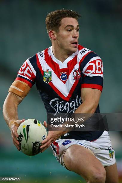 Connor Watson of the Roosters runs the ball during the round 24 NRL match between the Sydney Roosters and the Wests Tigers at Allianz Stadium on...