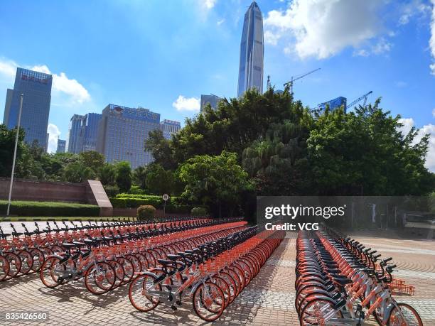 The customized shared bicycles with slogans that eulogize China are seen lined up on the street at Futian District on August 19, 2017 in Shenzhen,...