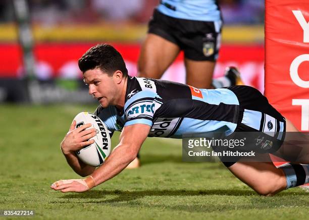Chad Townsend of the Sharks scores a try during the round 24 NRL match between the North Queensland Cowboys and the Cronulla Sharks at 1300SMILES...