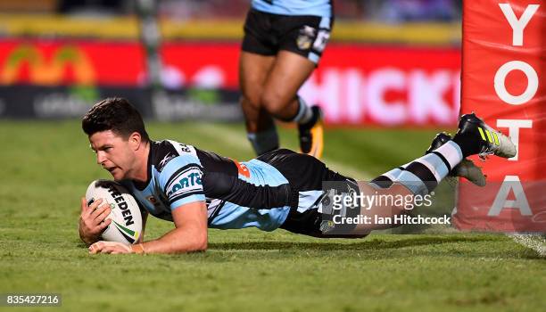 Chad Townsend of the Sharks scores a try during the round 24 NRL match between the North Queensland Cowboys and the Cronulla Sharks at 1300SMILES...