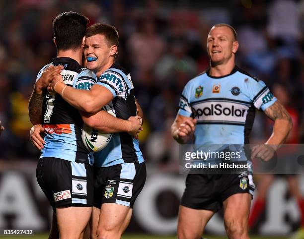 Chad Townsend of the Sharks celebrates after scoring a try during the round 24 NRL match between the North Queensland Cowboys and the Cronulla Sharks...
