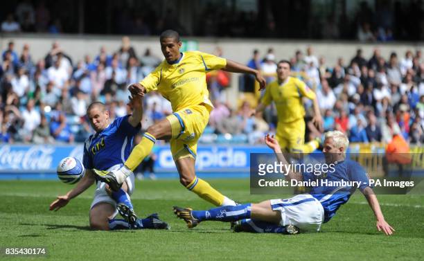 Millwall's Andy Frampton and Zak Whitbread stop Leeds' Jermaine Beckford from scoring with one of Leeds' best chances in the second half during the...