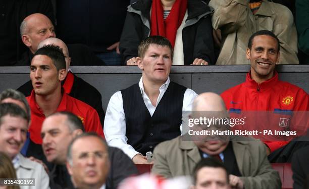 Manchester United's Federico Macheda, boxer Ricky Hatton and Rio Ferdinand in the stands
