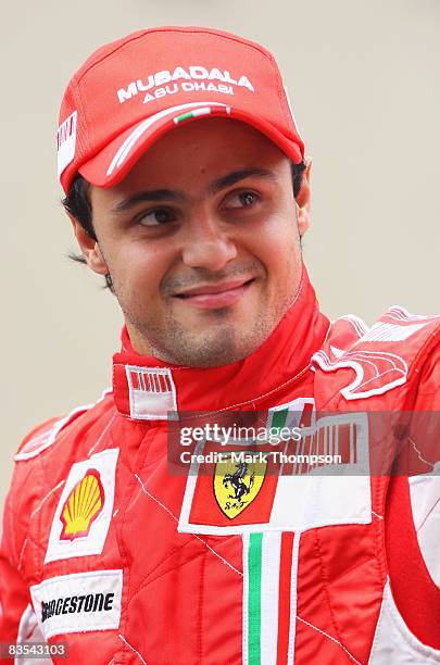 Felipe Massa of Brazil and Ferrari acknowledges fans at the drivers end of year photo session prior to the Brazilian Formula One Grand Prix at the...