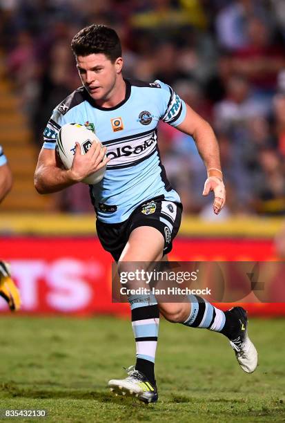 Chad Townsend of the Sharks runs to the tryline to score a try during the round 24 NRL match between the North Queensland Cowboys and the Cronulla...