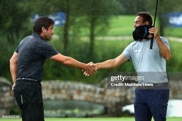 Robert Rock of England celebrates victory over Florian Fritsch of Germany on the 17th green during day three of the Saltire Energy Paul Lawrie...