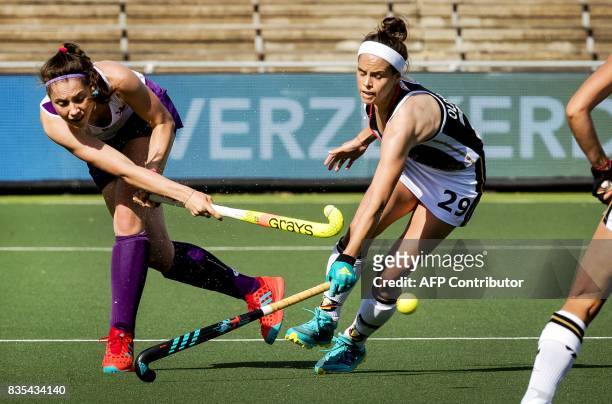 Germany's Pia-Sophie Oldhafer vies with Scotland's Katie Robertson during the women's Hockey Rabo EuroHockey Championships 2017 match between Germany...