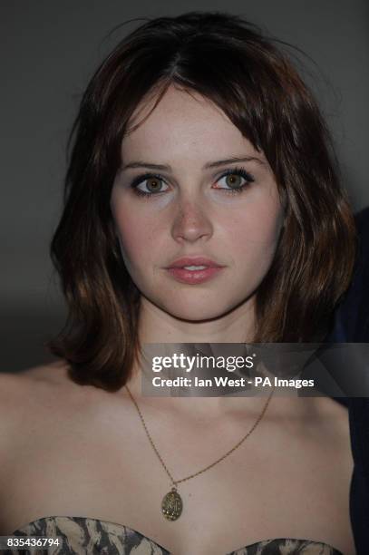 Felicity Jones arrives for the UK premiere of Cheri, at the Cine Lumiere, London.