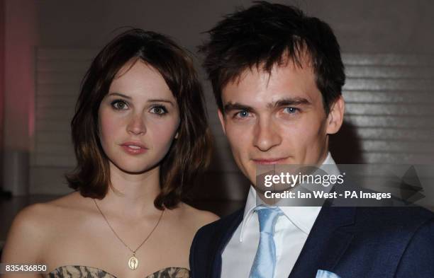 Felicity Jones and Rupert Friend arrive for the UK premiere of Cheri, at the Cine Lumiere, London.