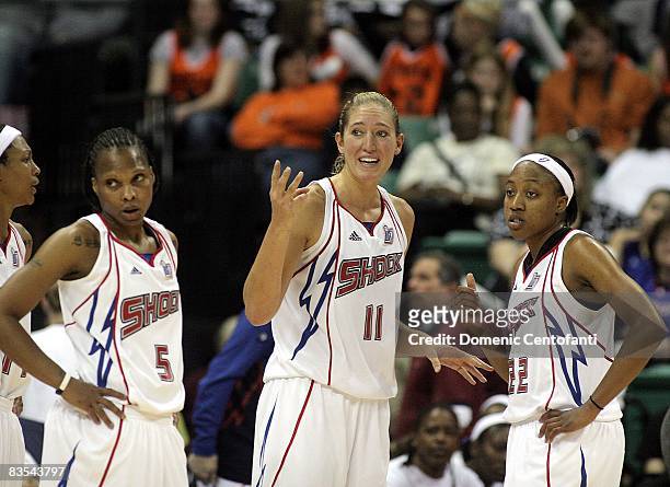 Kelly Schumacher and Alexis Hornbuckle of the Detroit Shock talk together during the game against the San Antonio Silver Stars in Game Three of the...