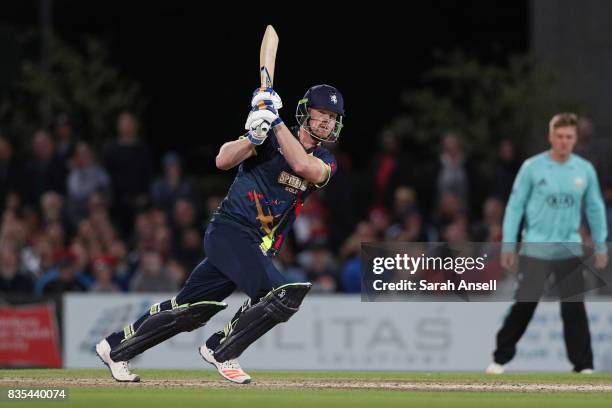 Jimmy Neesham of Kent Spitfires hits out during the NatWest T20 Blast South Group match between Kent Spitfires and Surrey at The Spitfire Ground on...