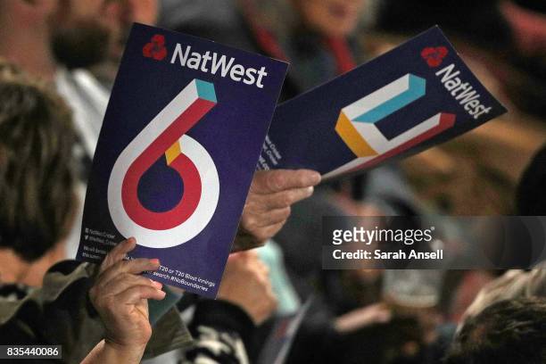 Four and Six cards waved by fans during the NatWest T20 Blast South Group match between Kent Spitfires and Surrey at The Spitfire Ground on August...