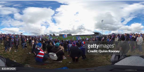 Fans on the hill cheer as the Bulldogs kick a goal during the round 22 AFL match between the Western Bulldogs and the Port Adelaide Power at Mars...