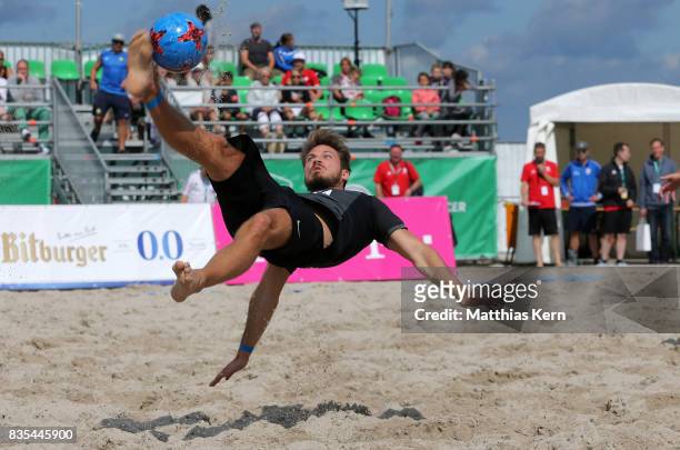 Player of Wuppertaler SV plays the ball on day 1 of the 2017 German Beach Soccer Championship on August 19, 2017 in Warnemunde, Germany.