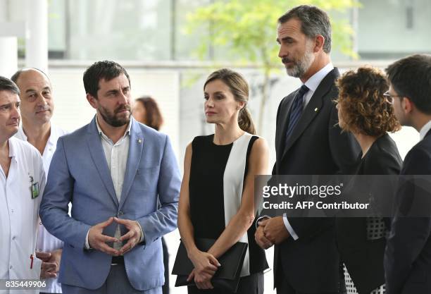 Spain's King Felipe VI and Queen Letizia arrive at the Hospital del Mar in Barcelona, to visit victims of the Barcelona attack on August 19 two day...